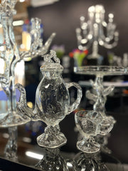 Close-up of optic teapot and teacup handmade in a exhibition stand setting